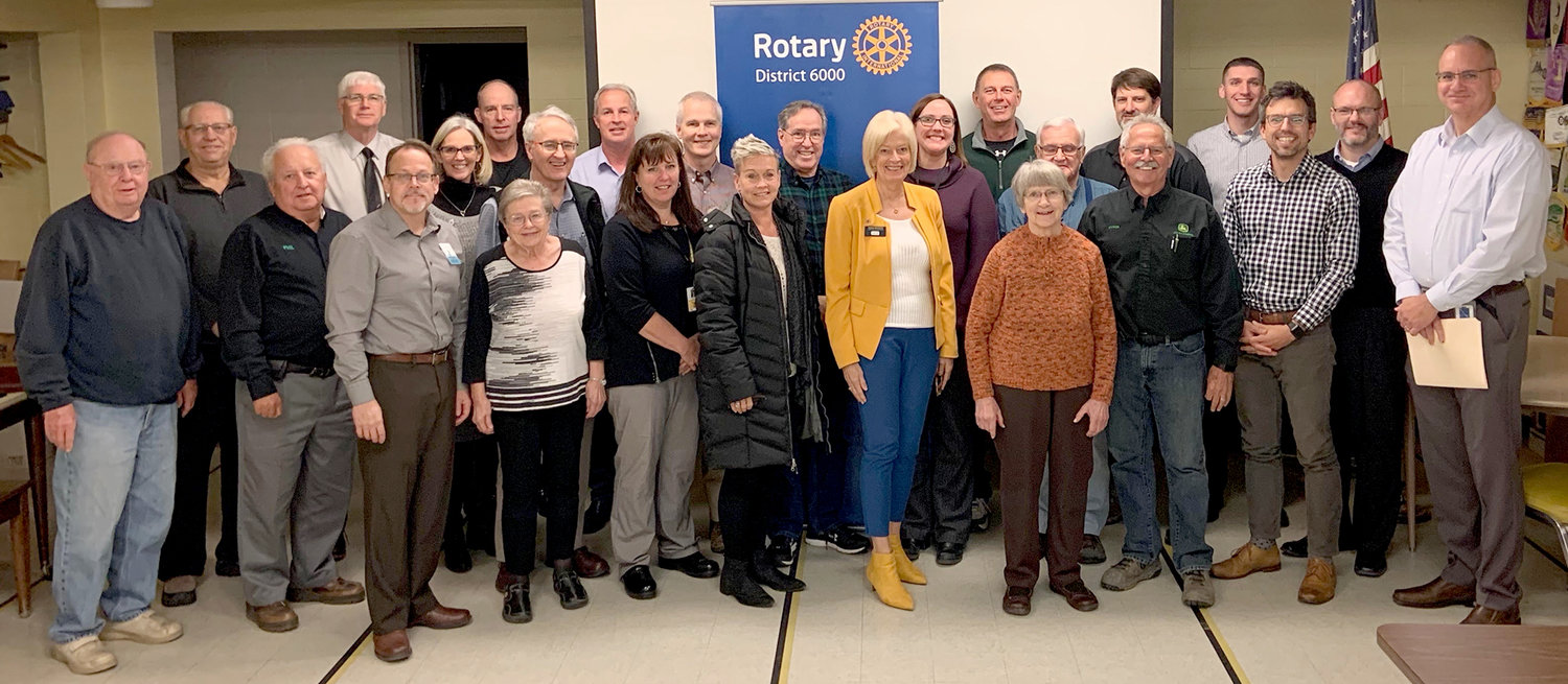 Morain, at center in photo, was accompanied by her husband, Steve. She talked with the clubs about the projects being done by Rotary International and each of the clubs, including hunger insecurity in Iowa, which is her emphasis for this year.